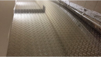 Лист стальной рифленый квинтет 1,2 мм 09Г2С фото лист стальной рифленый квинтет 1,2 мм 09Г2С купить в Барнауле